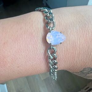 Silver chain bracelet with iridescent jewel